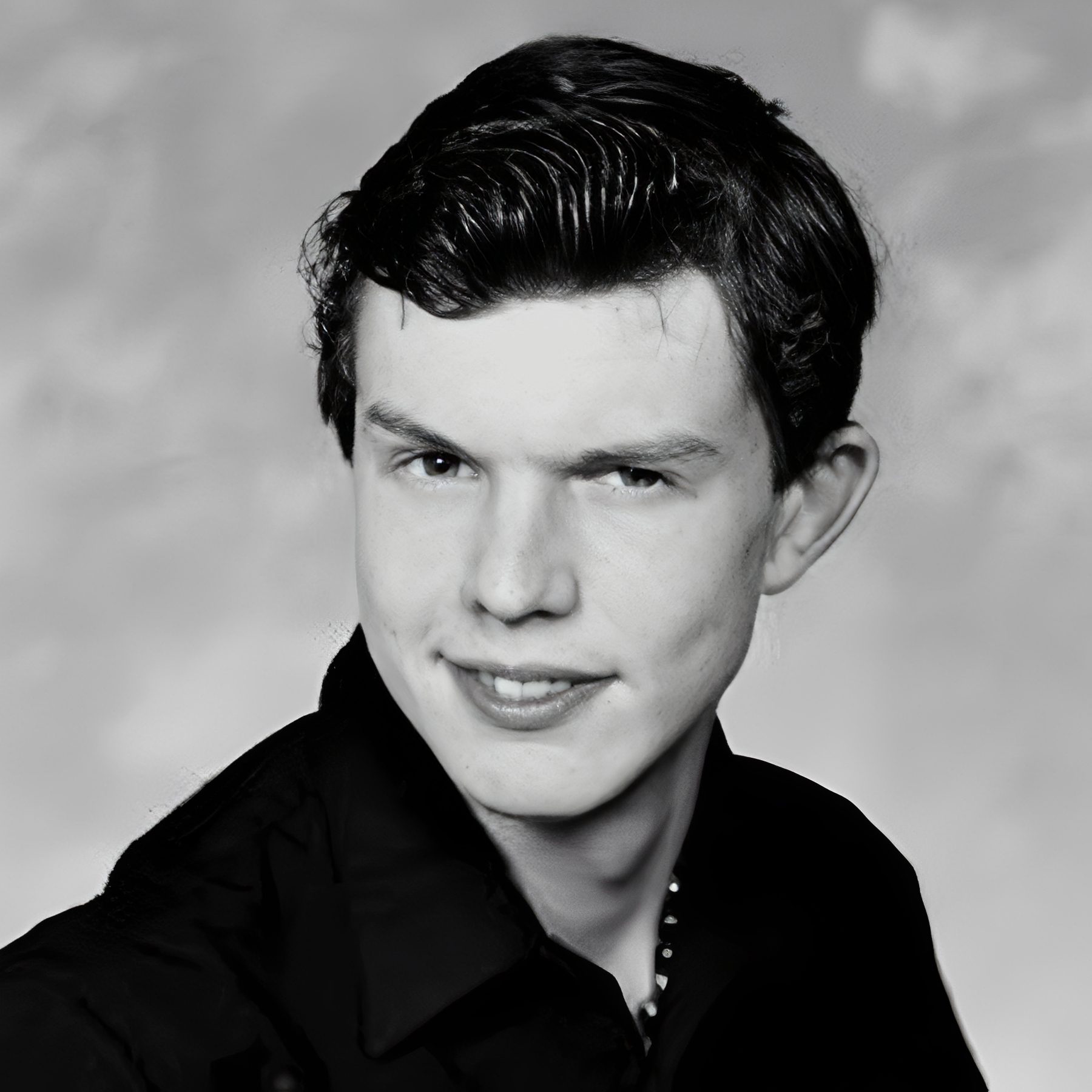 Black and white portrait of young man