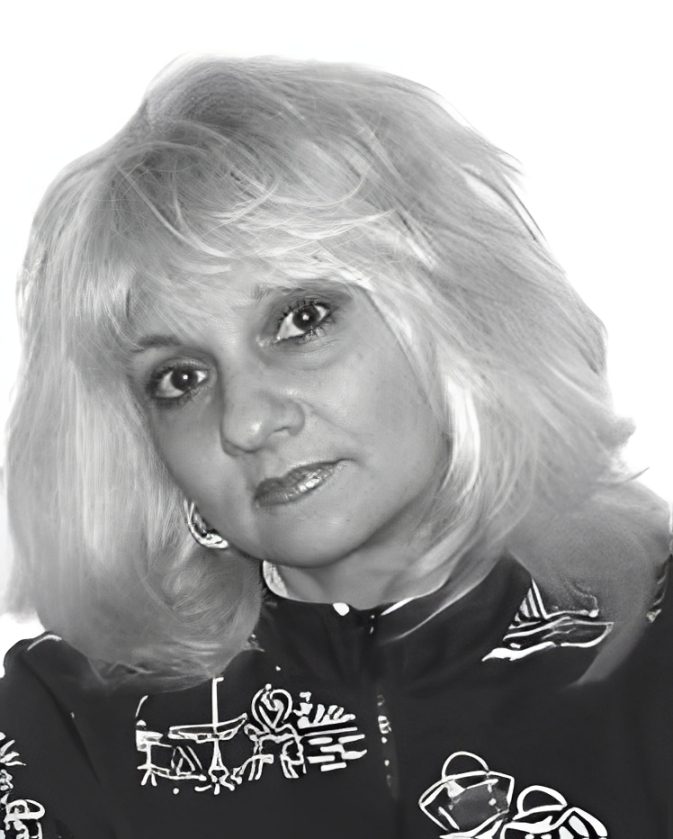 Black-and-white portrait of woman with blonde hair