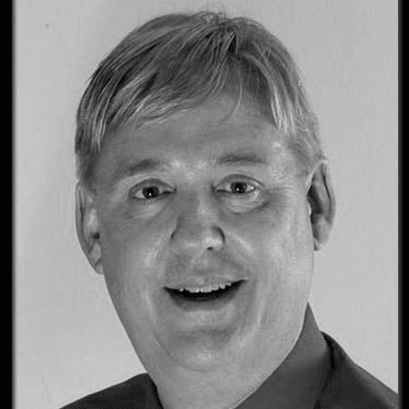 Headshot of smiling middle-aged man